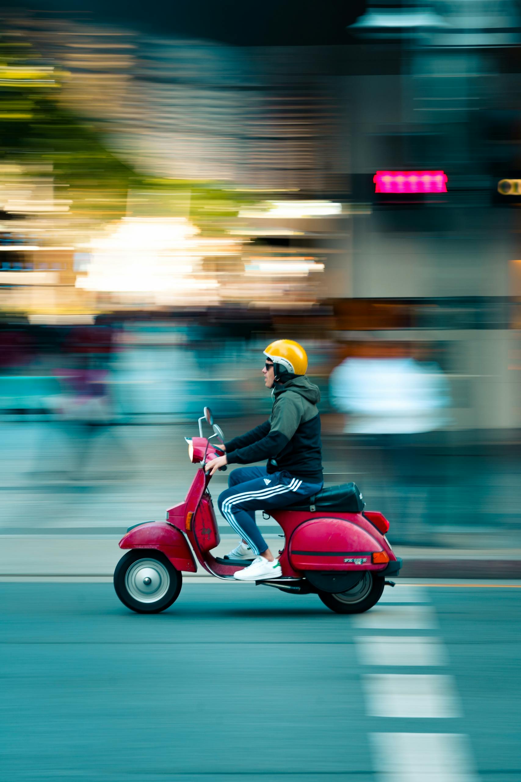 Capturing the vibrant motion of a scooter ride through Brisbane's urban streets.
