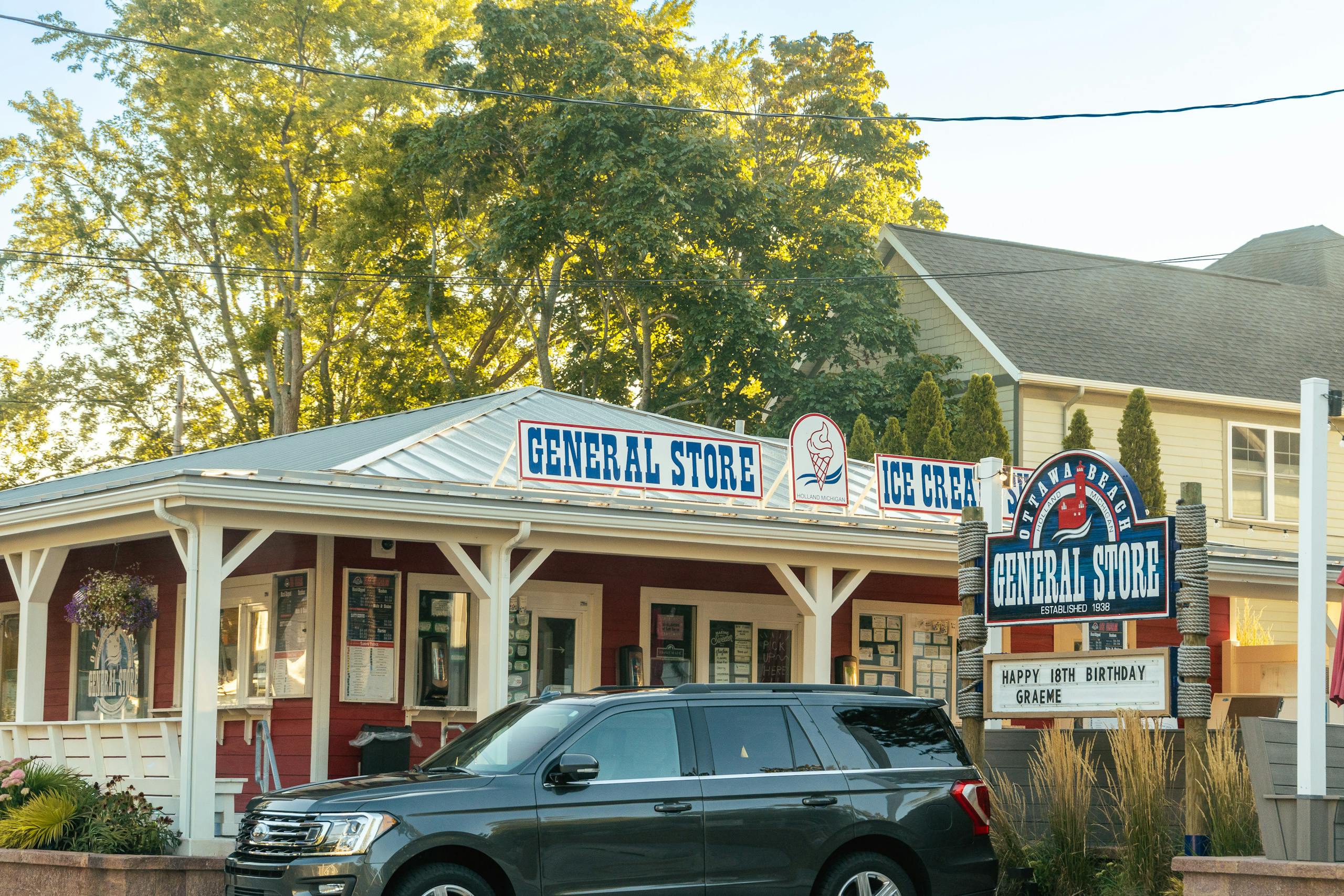 Charming general store with ice cream parlor in Holland, Michigan, on a sunny day.